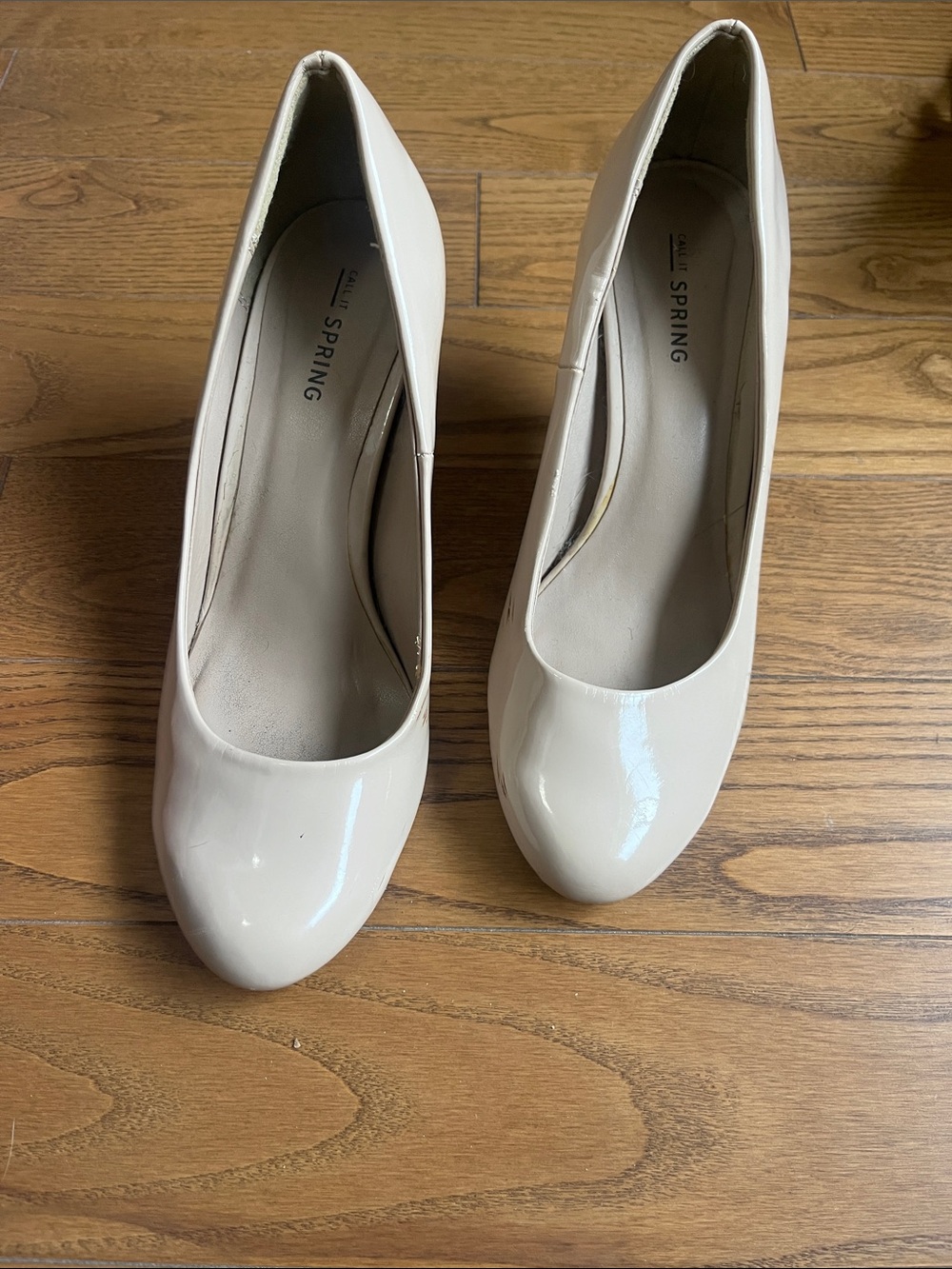 Call It Spring Cream Patent Round-Toe Pumps